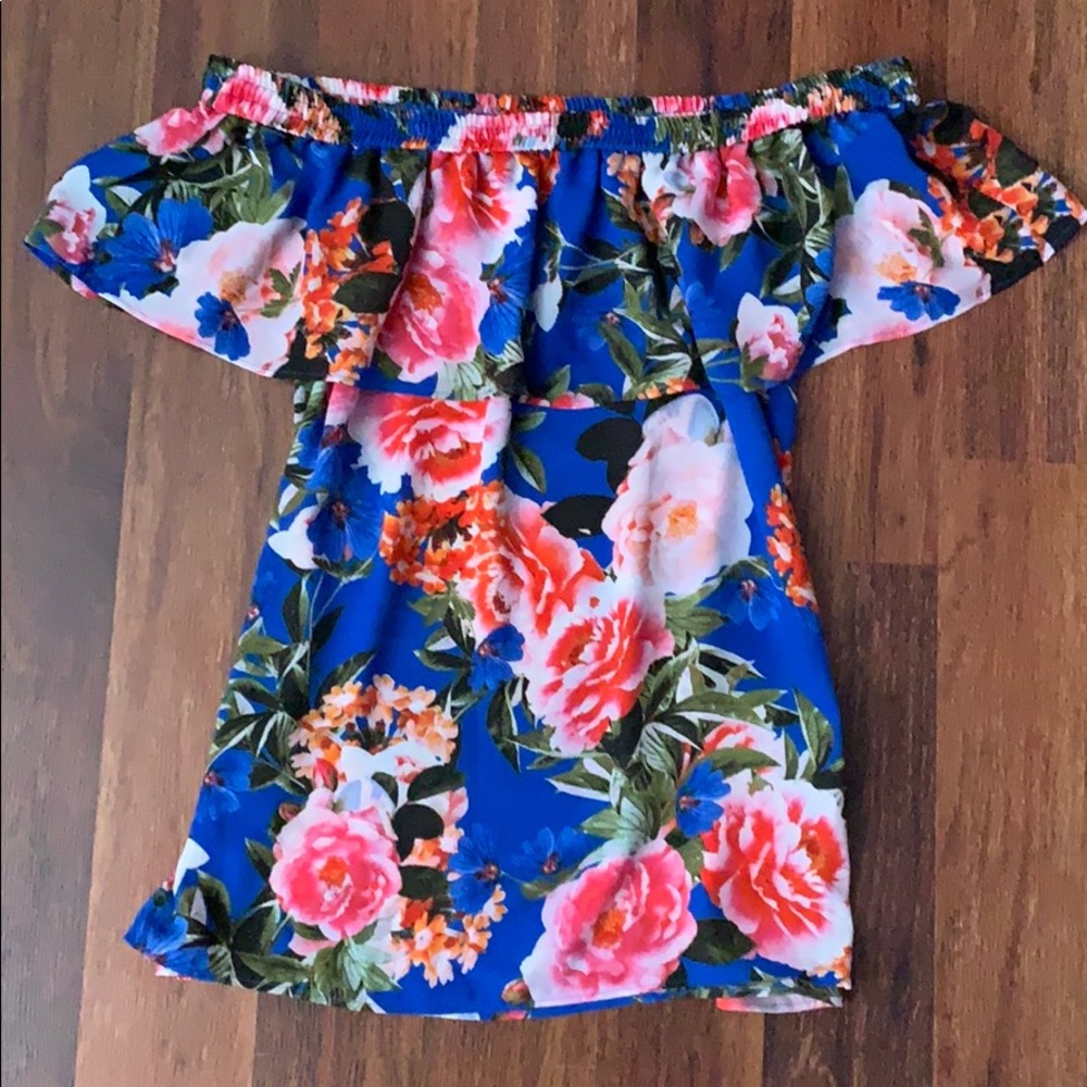 Off the shoulder blue top.